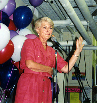 Candidates Forum - Geraldine w/ red dress (waving)